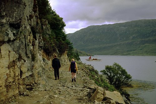 The widened track under the cliffs at the start of the walk