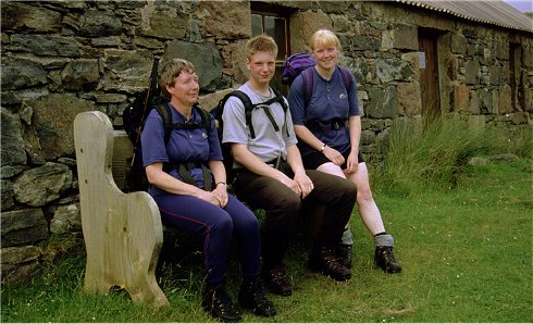 Sitting on the bench outside the Bothy Frontdoor