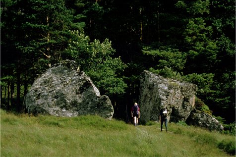 The path passes between this giant split boulder