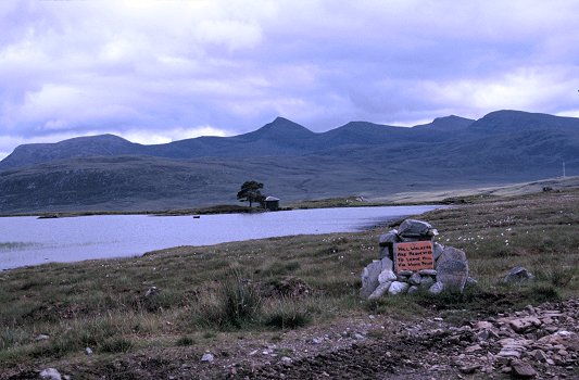 Back at Home Loch - with the sign 'Requesting' walkers to avoid the main house