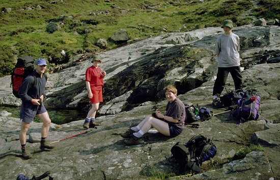 Resting by the stream on the climb to An Dorus