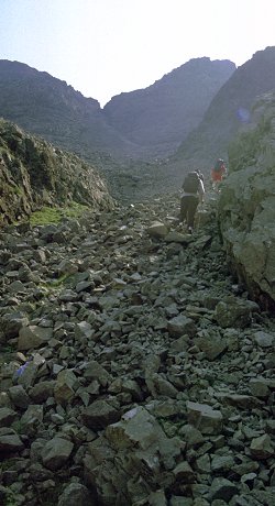Climbing the scree to An Dorus