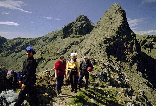 Putting on the harnesses at the foot of the West Ridge